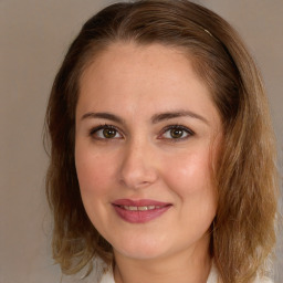 Joyful white young-adult female with medium  brown hair and brown eyes