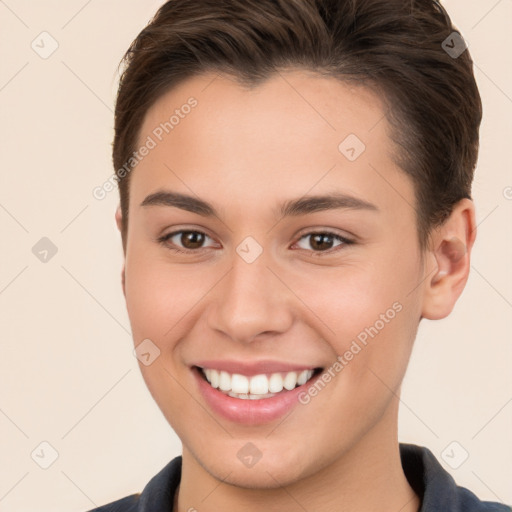 Joyful white young-adult female with short  brown hair and brown eyes