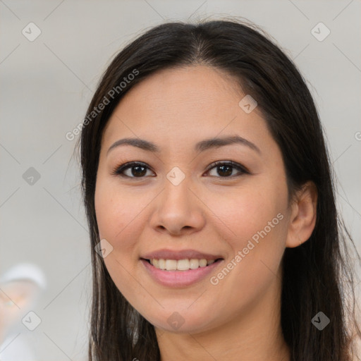 Joyful asian young-adult female with long  brown hair and brown eyes