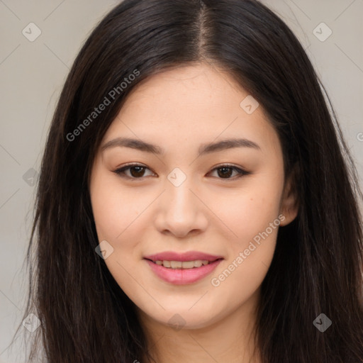 Joyful asian young-adult female with long  brown hair and brown eyes