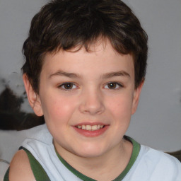 Joyful white child male with short  brown hair and brown eyes