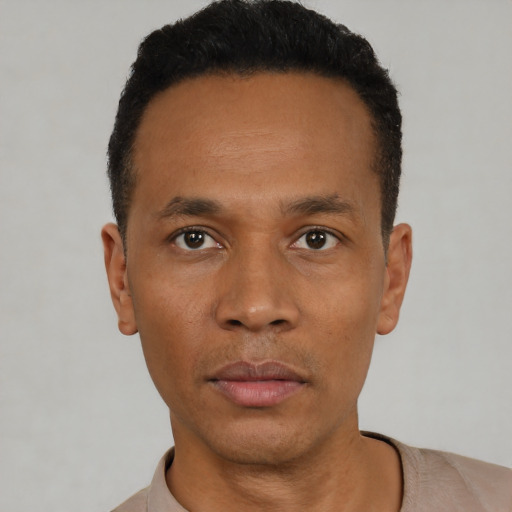 Neutral black young-adult male with short  black hair and brown eyes