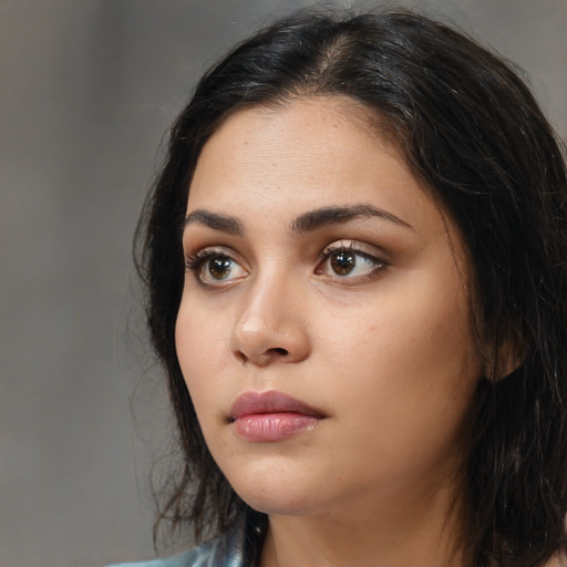 Neutral white young-adult female with medium  black hair and brown eyes