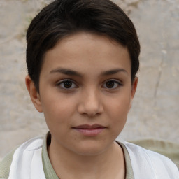 Joyful white child female with short  brown hair and brown eyes