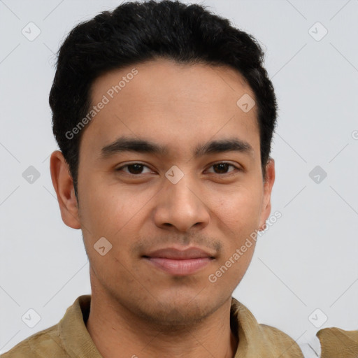 Joyful latino young-adult male with short  black hair and brown eyes