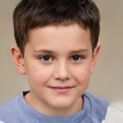 Joyful white child male with short  brown hair and brown eyes