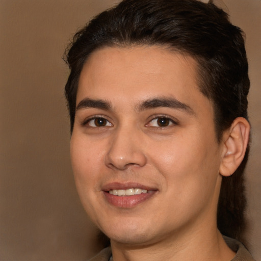 Joyful white young-adult male with medium  brown hair and brown eyes