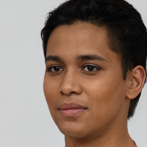 Neutral latino young-adult female with short  black hair and brown eyes