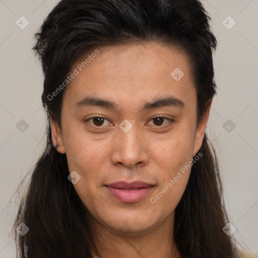 Joyful latino young-adult female with long  brown hair and brown eyes