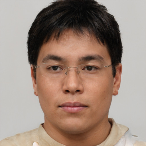 Neutral asian young-adult male with short  brown hair and brown eyes