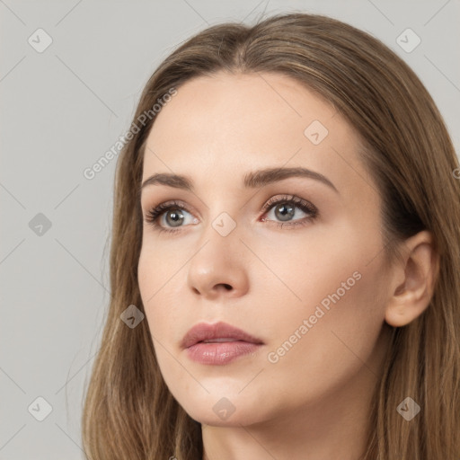 Neutral white young-adult female with long  brown hair and brown eyes