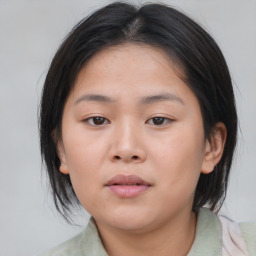 Neutral asian young-adult female with medium  brown hair and brown eyes