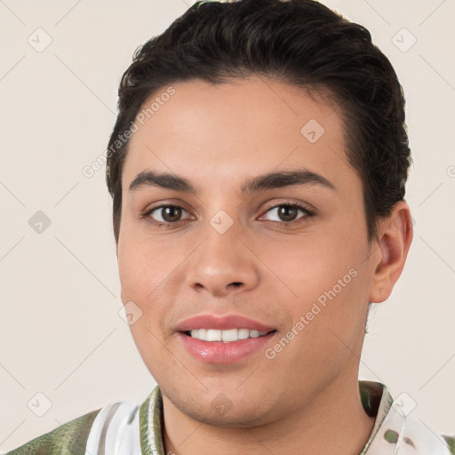 Joyful white young-adult male with short  brown hair and brown eyes