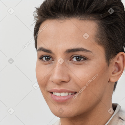 Joyful white young-adult female with short  brown hair and brown eyes