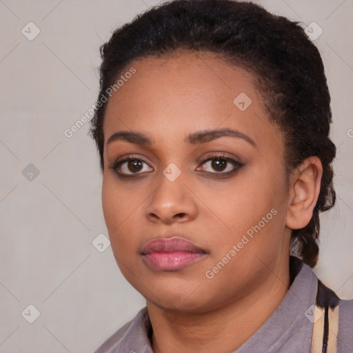 Neutral black young-adult female with short  brown hair and brown eyes