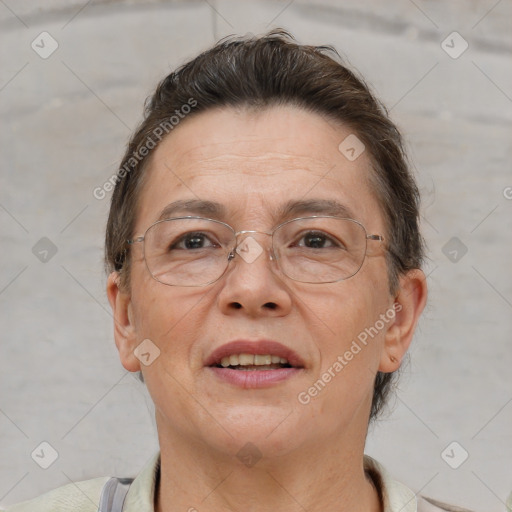 Joyful white adult female with short  brown hair and brown eyes