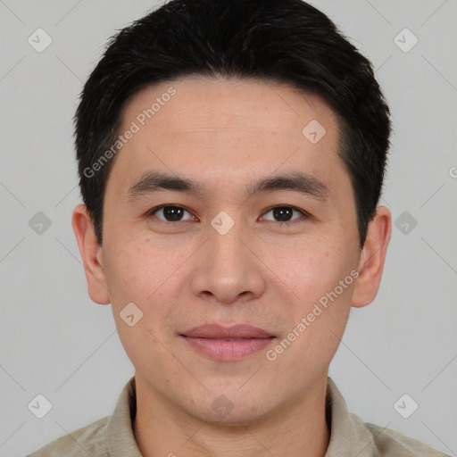 Joyful asian young-adult male with short  brown hair and brown eyes