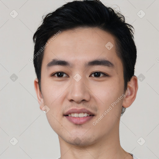 Joyful white young-adult male with short  black hair and brown eyes