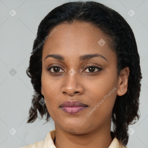 Joyful latino young-adult female with medium  black hair and brown eyes