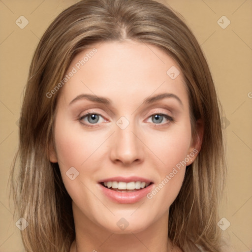 Joyful white young-adult female with long  brown hair and green eyes