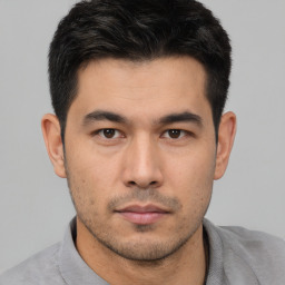 Neutral asian young-adult male with short  black hair and brown eyes