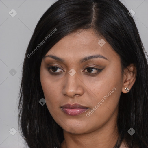 Joyful asian young-adult female with long  brown hair and brown eyes