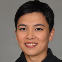 Joyful asian young-adult female with short  black hair and brown eyes