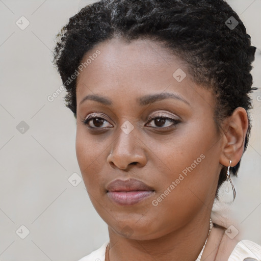 Neutral black young-adult female with short  brown hair and brown eyes