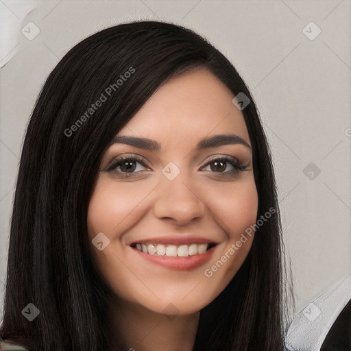 Joyful white young-adult female with long  black hair and brown eyes