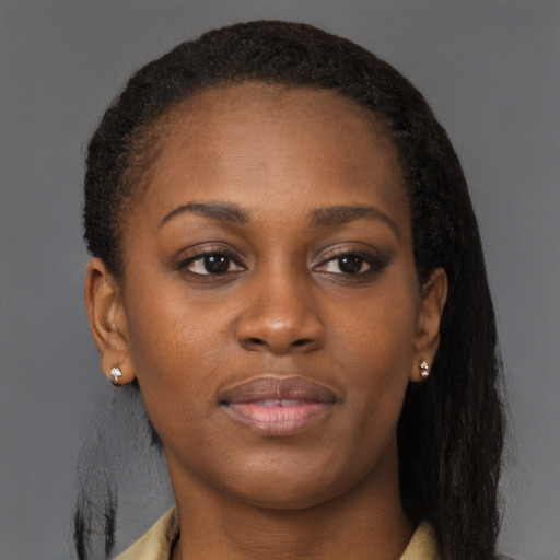 Neutral black young-adult female with long  brown hair and brown eyes