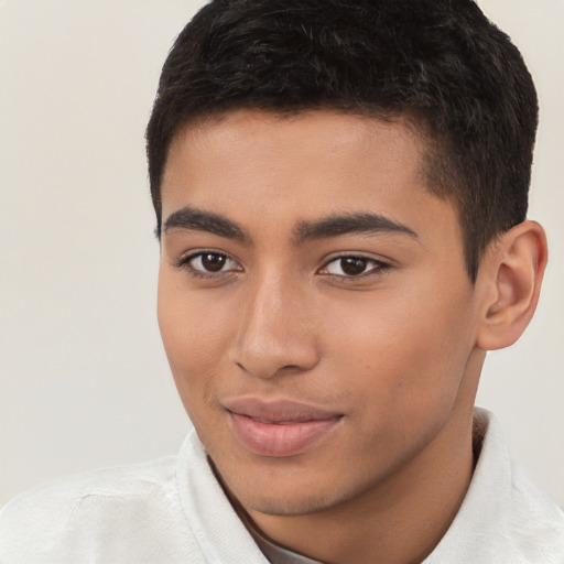 Joyful latino young-adult male with short  brown hair and brown eyes