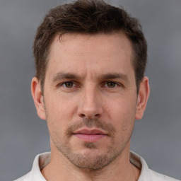 Neutral white adult male with short  brown hair and brown eyes