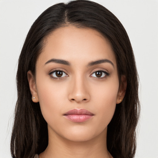 Neutral latino young-adult female with long  black hair and brown eyes