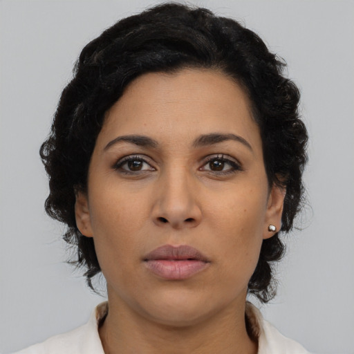 Neutral latino young-adult female with medium  black hair and brown eyes