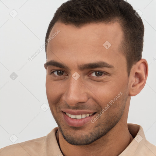 Joyful white young-adult male with short  brown hair and brown eyes