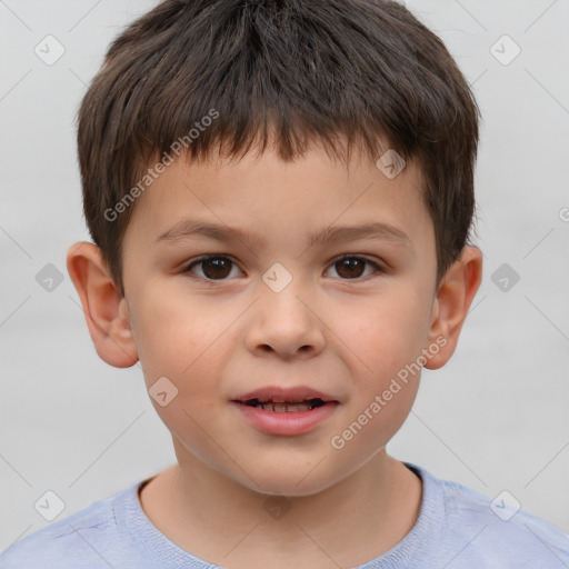 Joyful white child male with short  brown hair and brown eyes