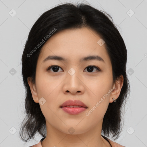 Joyful asian young-adult female with medium  black hair and brown eyes