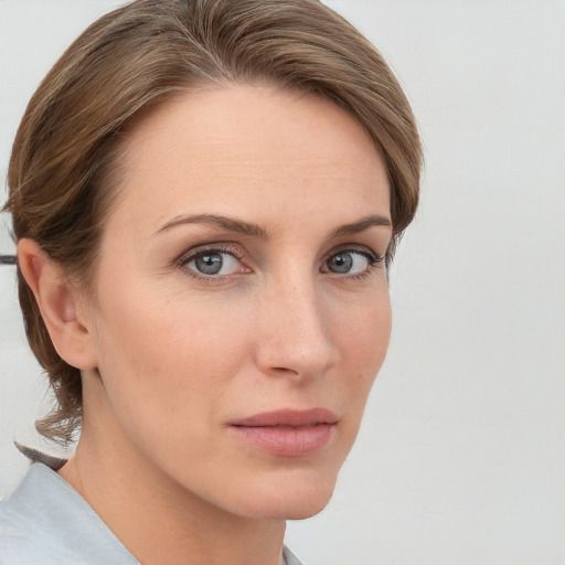 Neutral white young-adult female with medium  brown hair and grey eyes