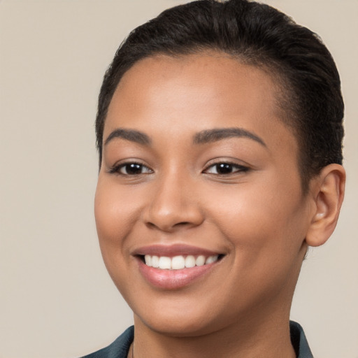 Joyful white young-adult female with short  brown hair and brown eyes