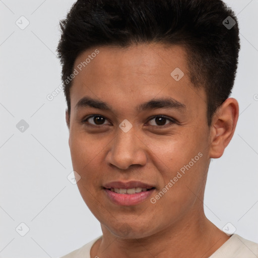 Joyful white young-adult male with short  black hair and brown eyes