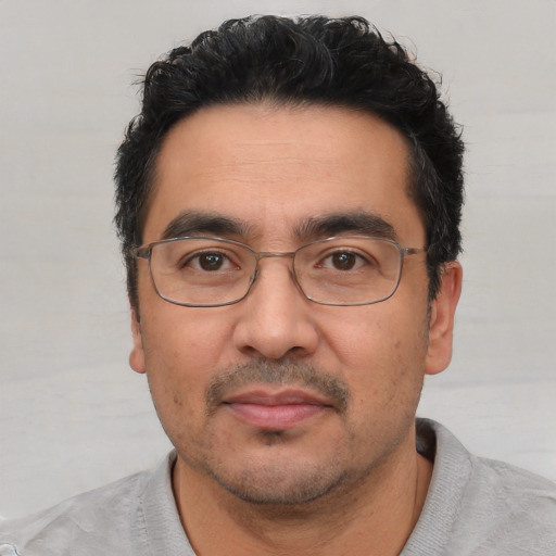 Neutral white adult male with short  black hair and brown eyes