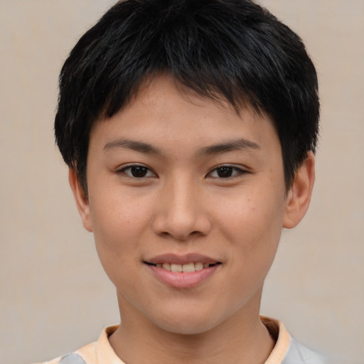 Joyful asian young-adult female with short  brown hair and brown eyes
