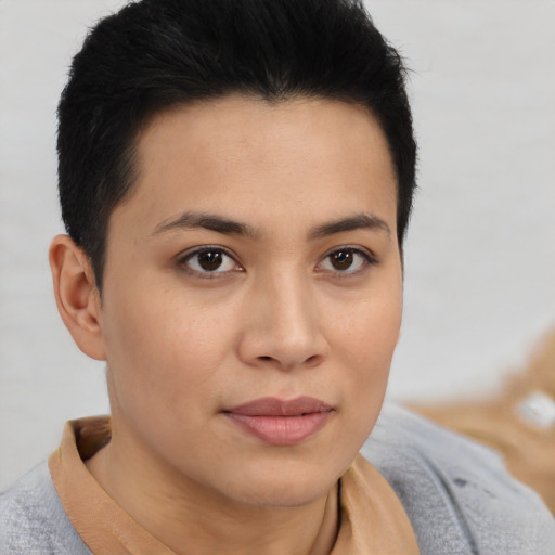 Joyful asian young-adult female with short  brown hair and brown eyes