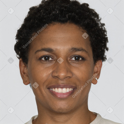 Joyful black young-adult female with short  brown hair and brown eyes