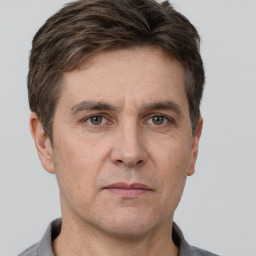 Neutral white adult male with short  brown hair and brown eyes