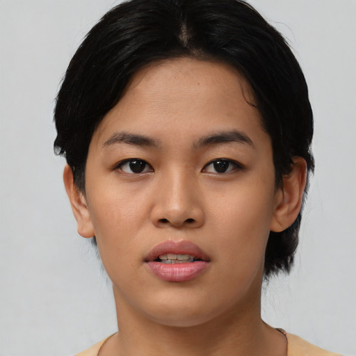 Neutral asian young-adult female with medium  black hair and brown eyes