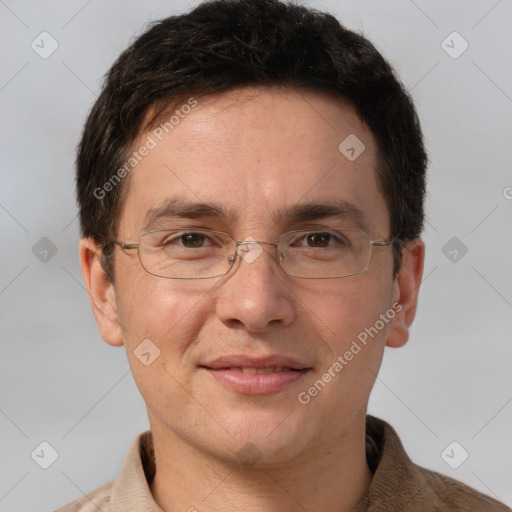 Joyful white adult male with short  brown hair and grey eyes