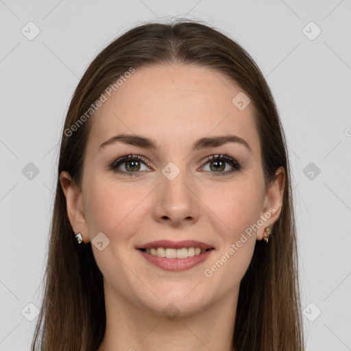 Joyful white young-adult female with long  brown hair and grey eyes