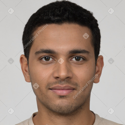 Joyful latino young-adult male with short  brown hair and brown eyes