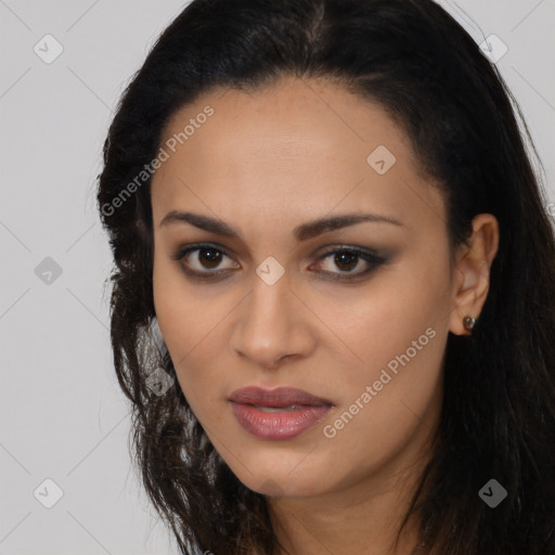 Joyful latino young-adult female with long  brown hair and brown eyes